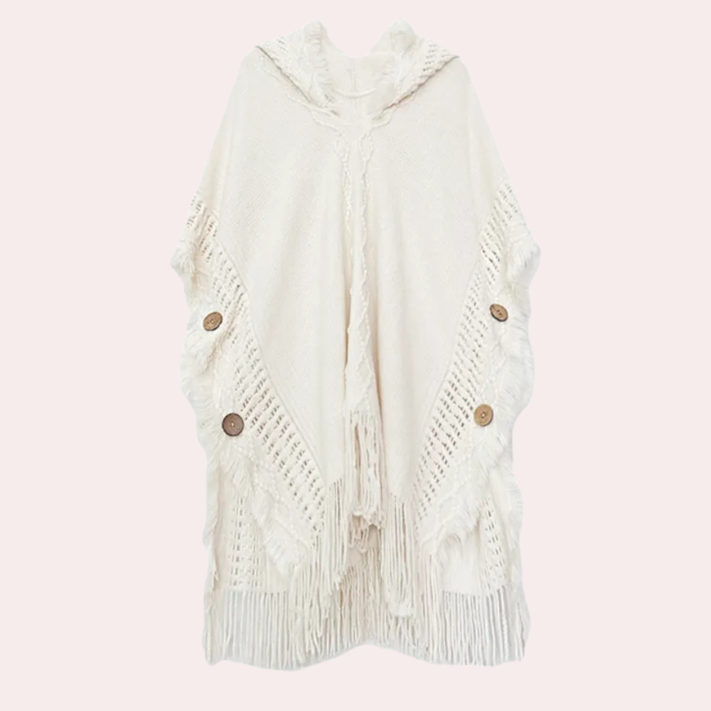 Crèmekleurige gebreide poncho met franjes en houten knopen, boho-stijl, damesmode, warme winterkleding, stijlvolle en comfortabele omslagdoek.