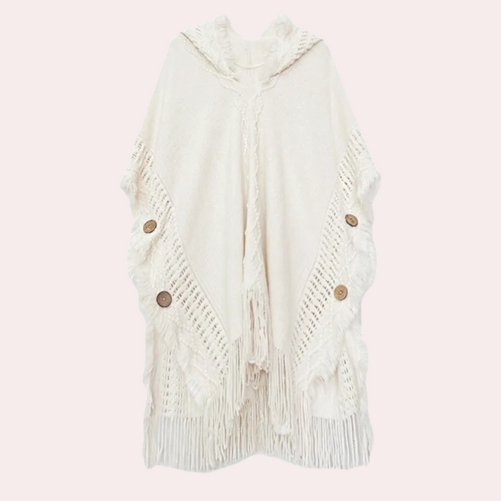 Crèmekleurige gebreide poncho met franjes en houten knopen, boho-stijl, damesmode, warme winterkleding, stijlvolle en comfortabele omslagdoek.