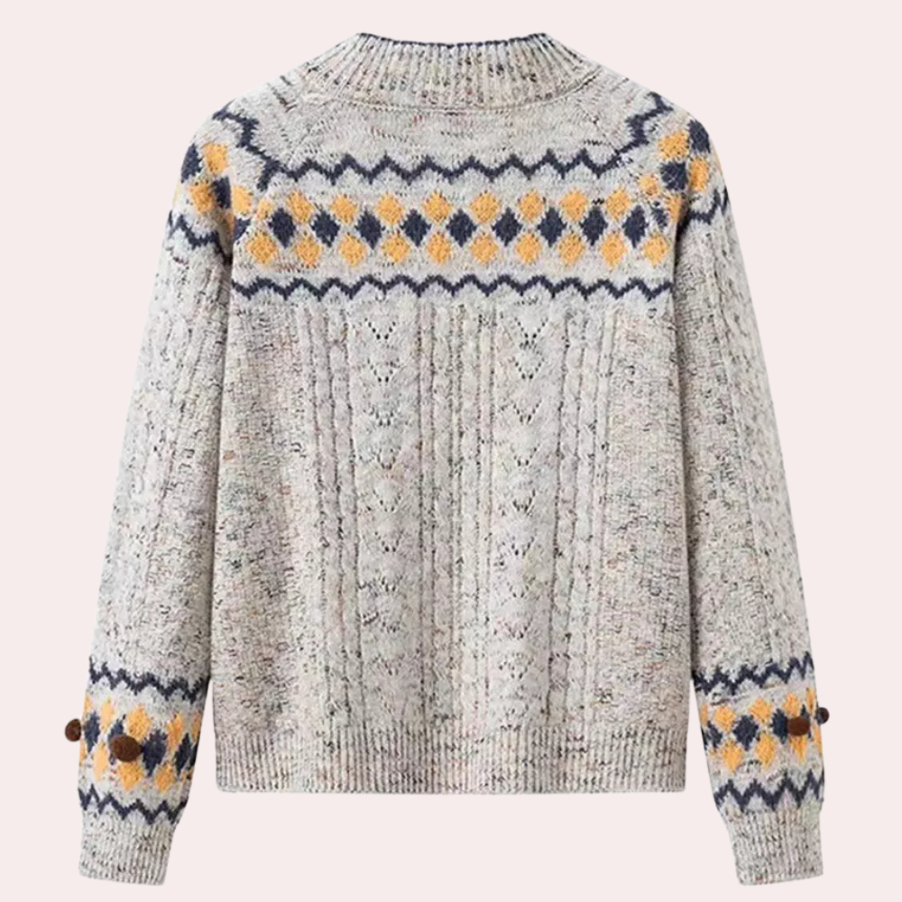 Grijze gebreide trui met kleurrijk Noors patroon, kabeldetails en ronde hals. Perfect voor wintermode en casual outfits. Unisex design.