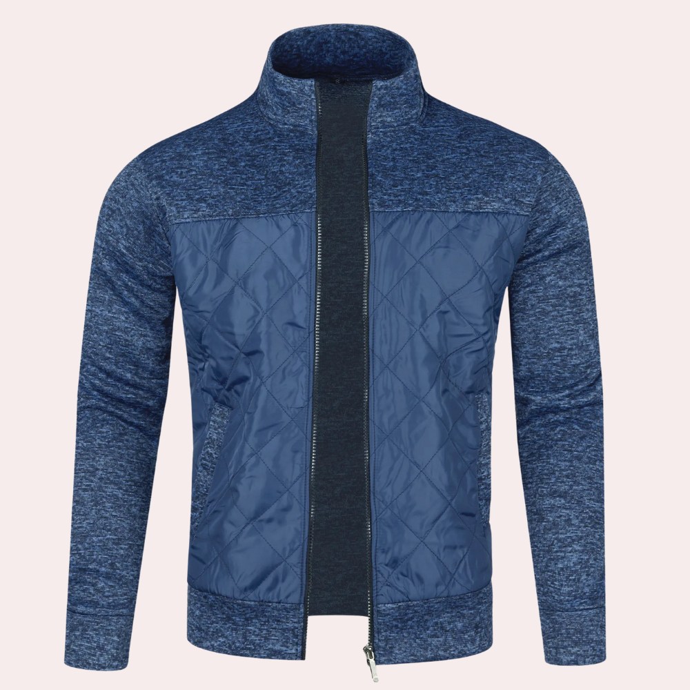 Blauwe herenjas met rits, gewatteerd ontwerp, hoge kraag en gemêleerde mouwen. Stijlvolle en warme jas voor casual en sportieve gelegenheden.