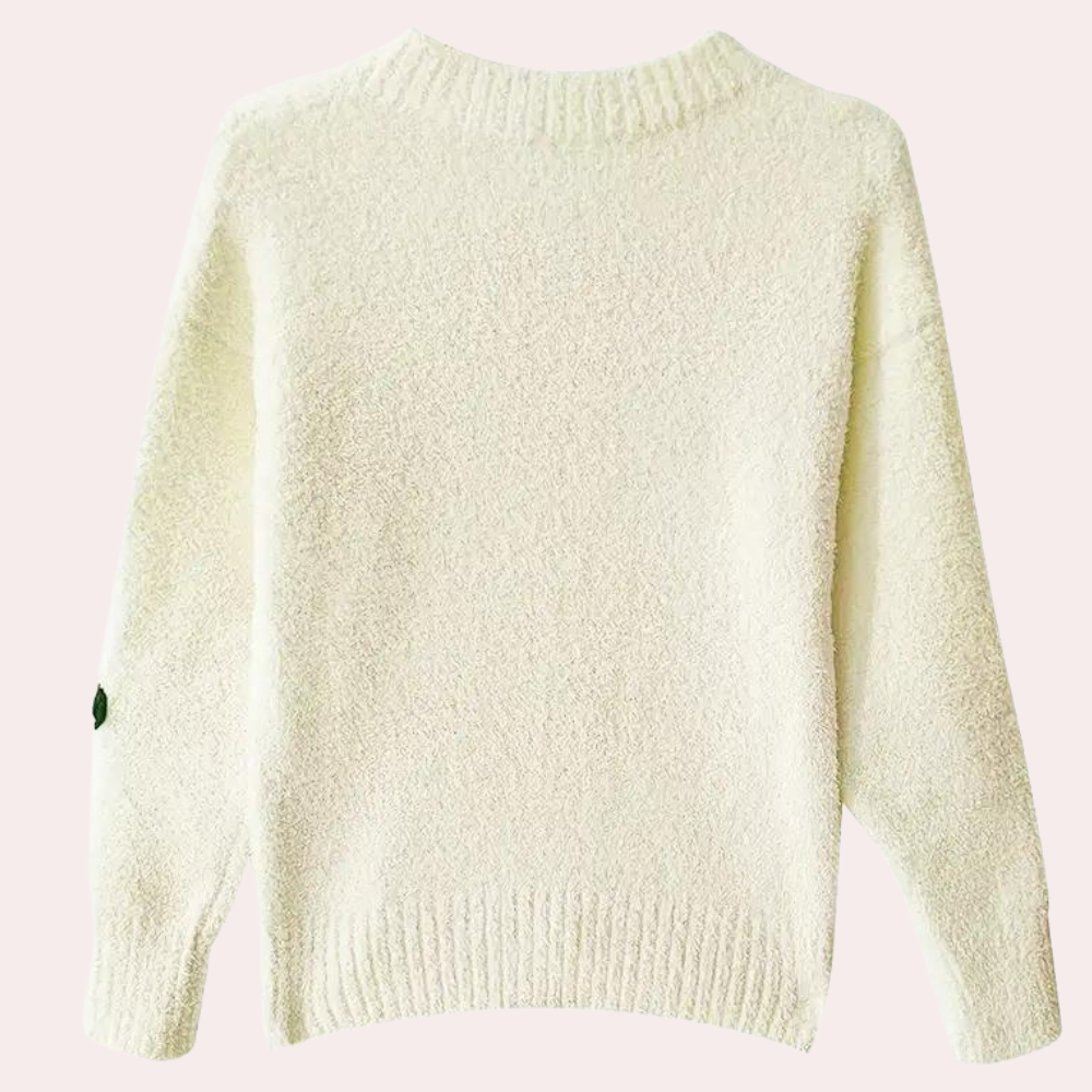 Crèmekleurige gebreide trui met lange mouwen, ronde hals en subtiel textuurpatroon. Perfect voor herfst- en wintermode. Unisex kledingstijl.