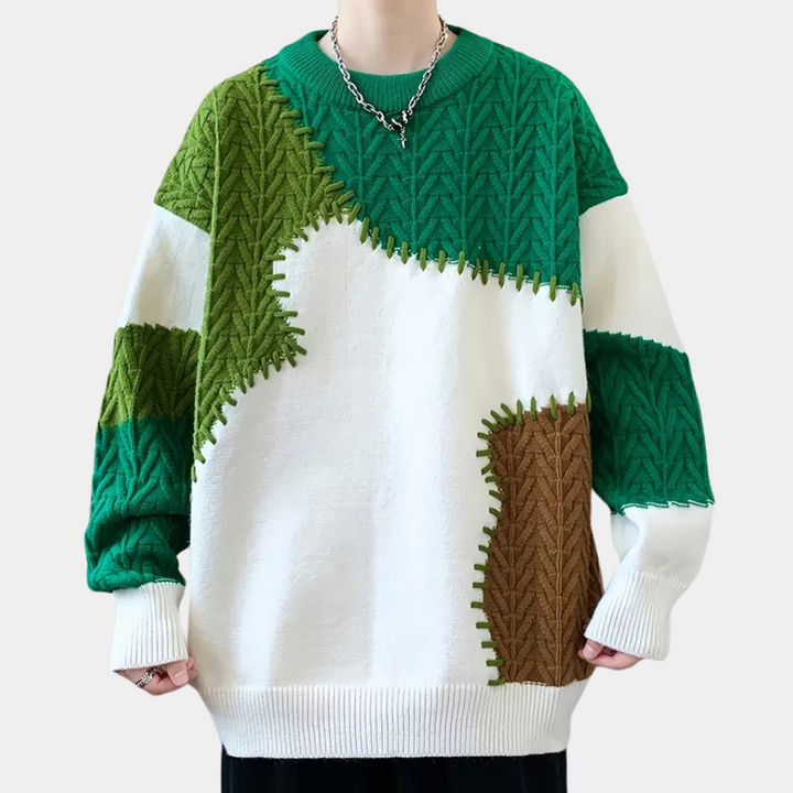 Groene en witte oversized trui met gebreid patroon en bruine accenten, unisex design, perfect voor herfstmode. Comfortabele en stijlvolle kleding.