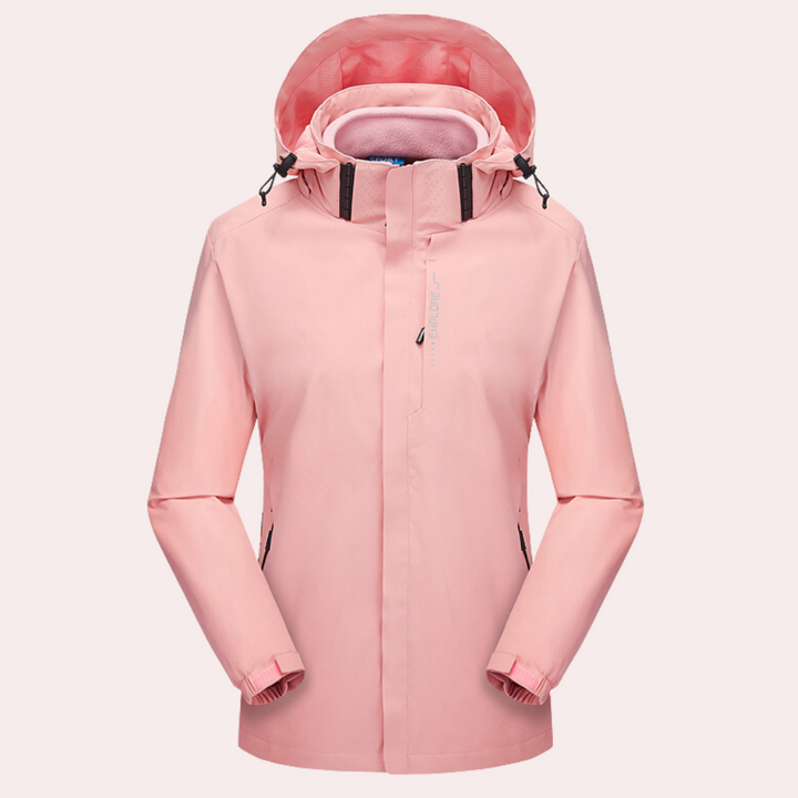 Roze damesregenjas met capuchon, waterdicht en ademend, ideaal voor outdooractiviteiten. Stijlvolle en functionele regenjas voor dames.