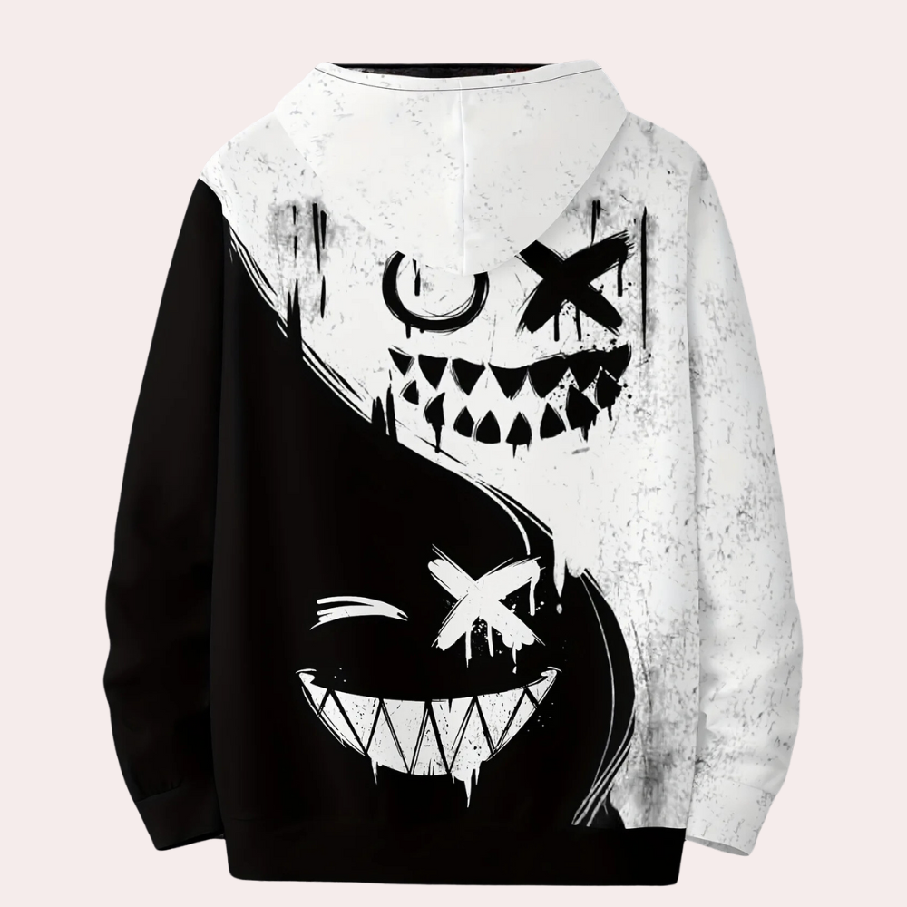 Zwart-witte hoodie met abstracte, grijnzende gezichten en yin-yang ontwerp. Streetwear mode, unisex, grafische print, casual stijl.