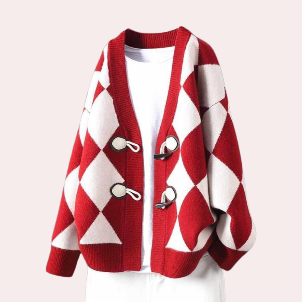 Rode en witte ruitjes cardigan met oversized pasvorm en unieke knoopsluiting, perfect voor herfstmode. Stijlvolle dameskleding, trendy en comfortabel.