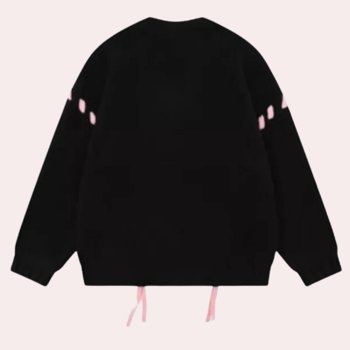 Zwarte trui met roze details, lange mouwen en ronde hals. Modieuze streetwear, unisex design, perfect voor casual outfits en herfstmode.