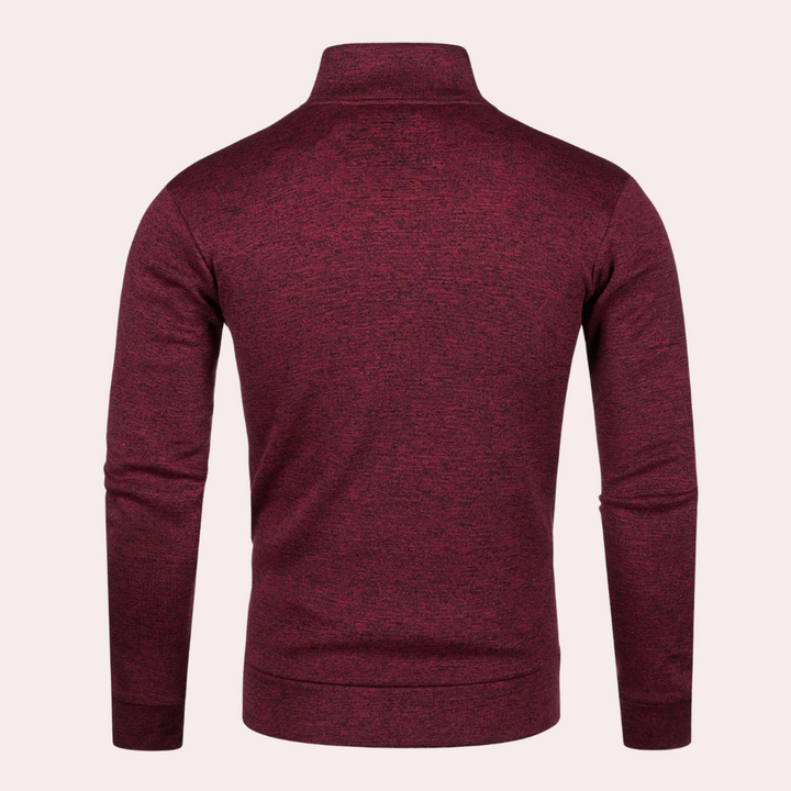 Bordeauxrode heren trui met lange mouwen en opstaande kraag, gemaakt van zachte stof. Ideaal voor casual en formele gelegenheden.