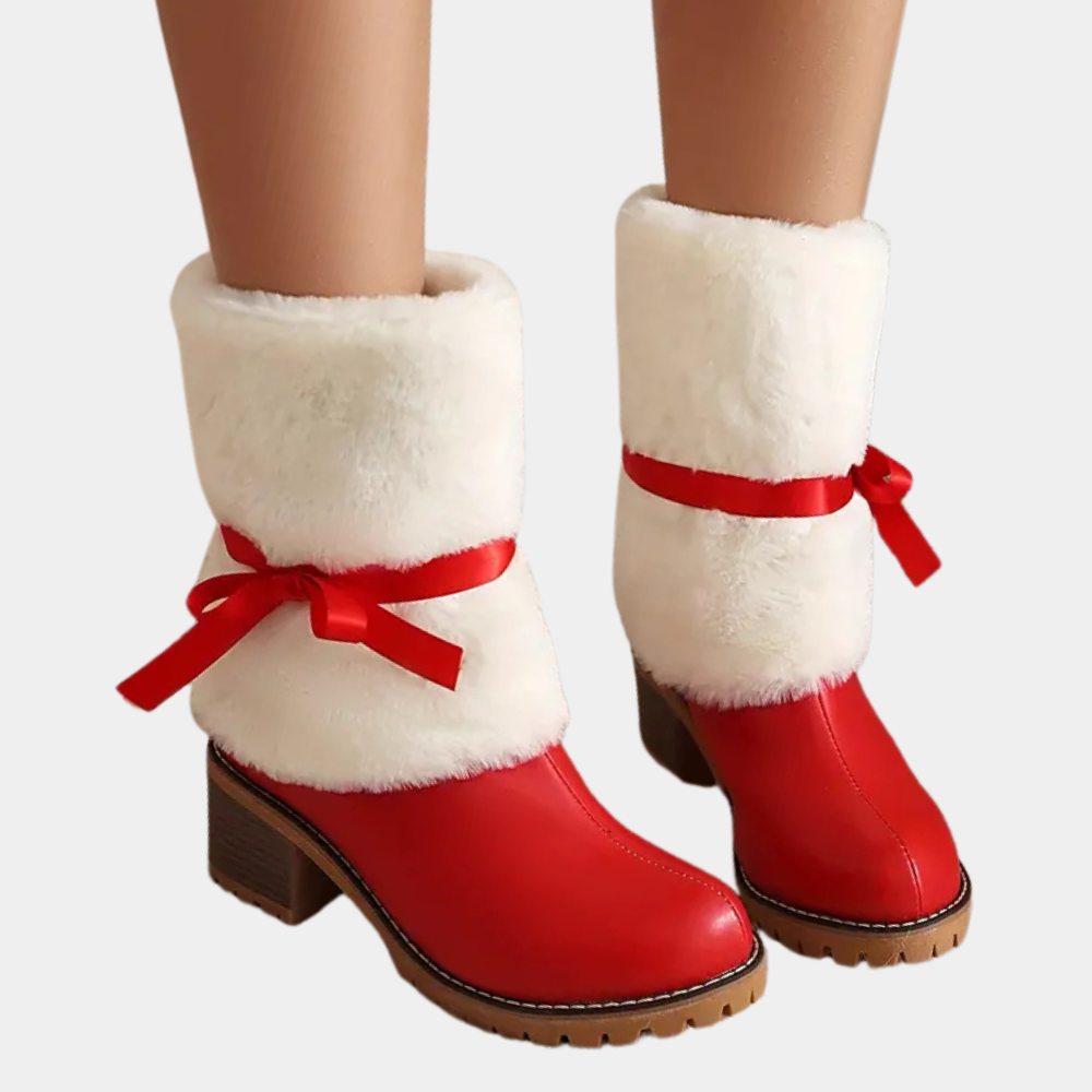 Rode dameslaarzen met witte bontkraag en rode strik, wintermode, trendy schoenen, comfortabele hakken, warme laarzen voor koude dagen.