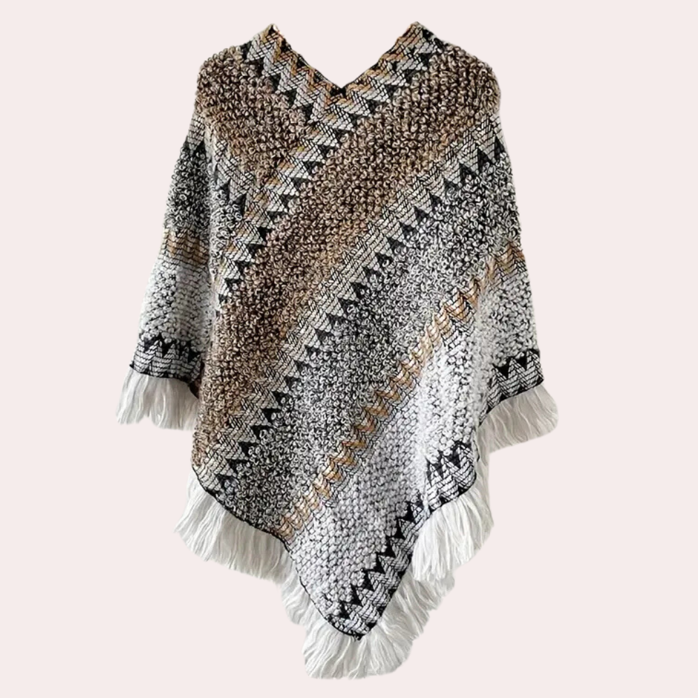 Gehaakte poncho met geometrisch patroon, aardetinten en franjes. Handgemaakt, boho-stijl, warme wintermode, dameskledingaccessoire.