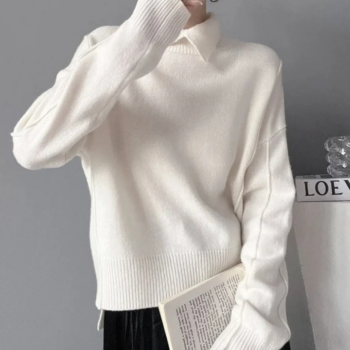 Witte trui damesmode, gebreide coltrui, casual winterkleding, stijlvolle outfit, comfortabele pasvorm, trendy dameskleding, modieuze look.