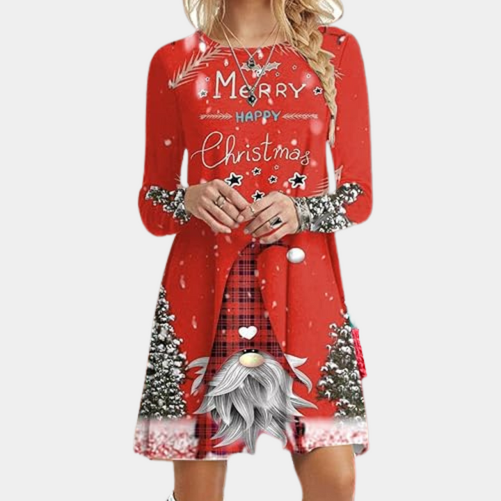 Vrouw in rode kerstjurk met kerstman-ontwerp, sneeuwvlokken en tekst "Merry Happy Christmas". Perfect voor feestelijke mode en kerstkleding.