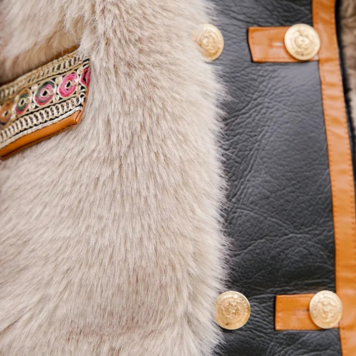 Detail van een luxe jas met beige bont, zwart leer en gouden knopen. Modieuze winterkleding, hoogwaardige materialen, stijlvolle afwerking.