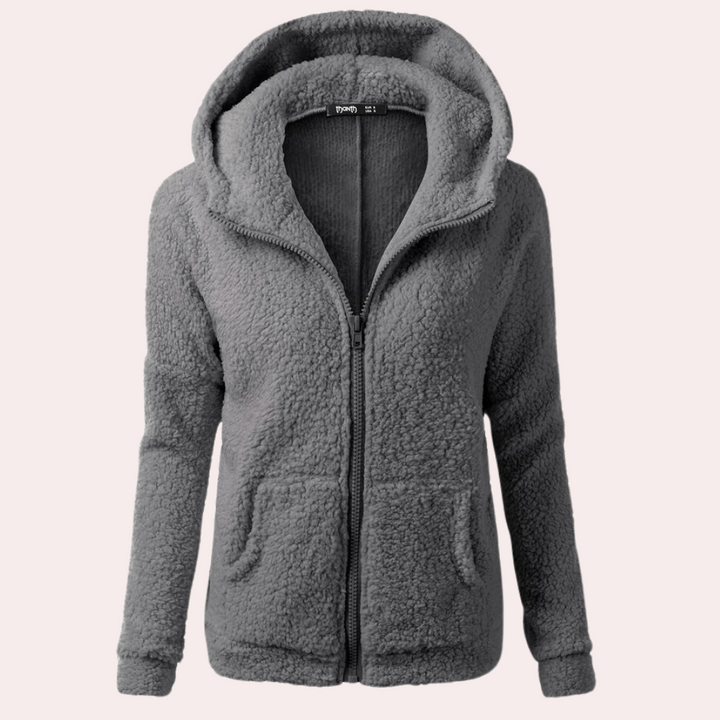 Grijze fleece hoodie met rits, zachte textuur, twee zakken, comfortabele pasvorm. Perfect voor casual en warme winterkleding. Unisex ontwerp.