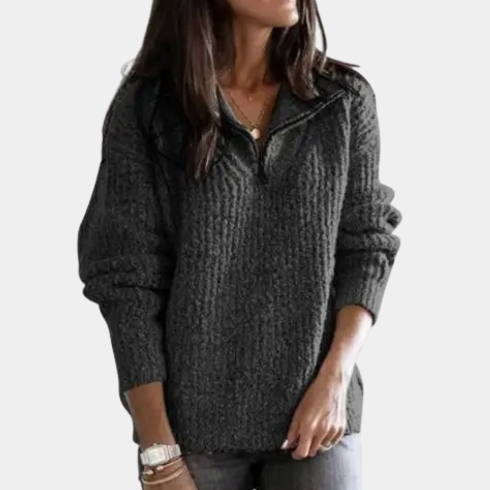 Donkergrijze damestrui met halve rits, gebreid patroon, lange mouwen. Stijlvolle en comfortabele kleding voor herfst en winter.