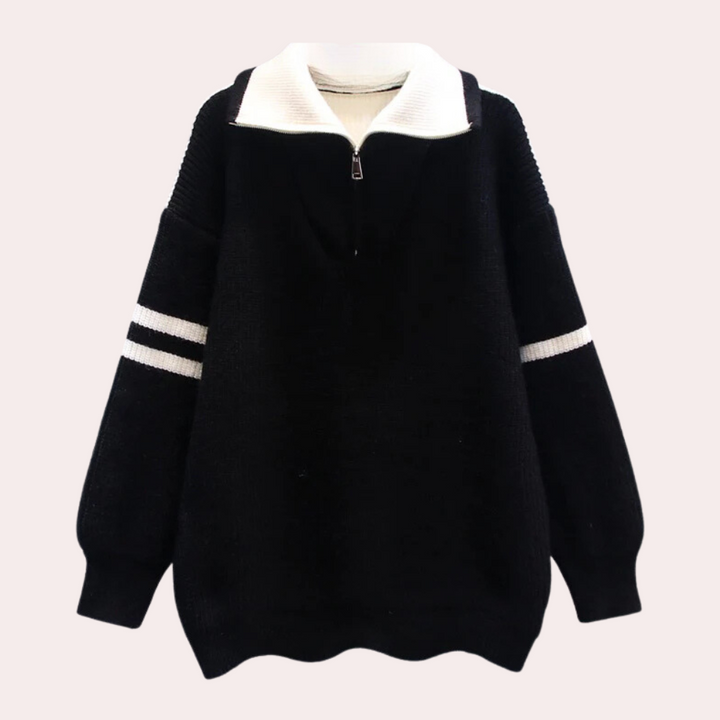 Zwarte oversized trui met witte kraag en strepen op de mouwen, modieuze dameskleding, comfortabele herfst- en winterstijl.
