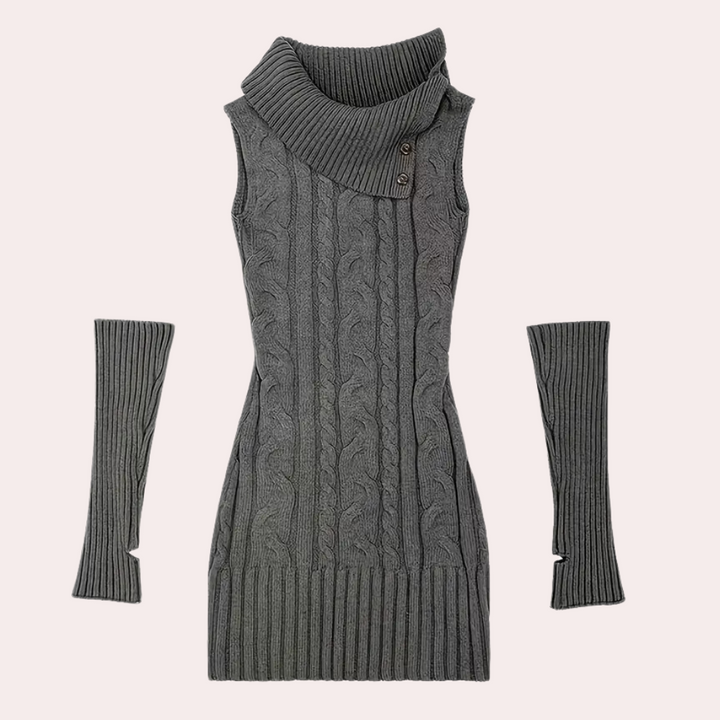 Grijze gebreide mouwloze trui met col en knopen, inclusief bijpassende armwarmers. Stijlvolle damesmode, winterkleding, warme outfit.