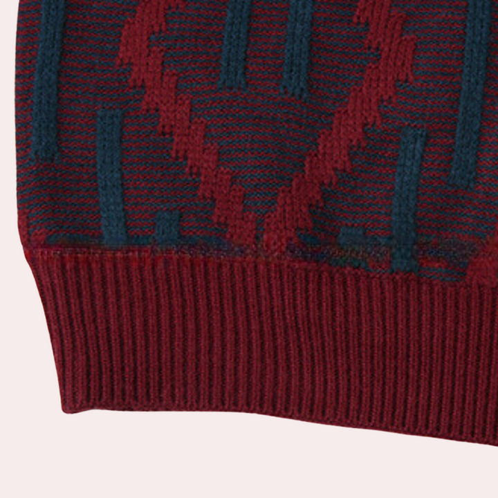Rode gebreide muts met geometrisch patroon, winteraccessoire, warme wollen beanie, unisex mode, stijlvolle hoofdbedekking voor koude dagen.