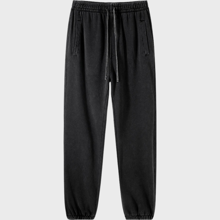 Zwarte joggingbroek met elastische tailleband en trekkoord, comfortabele pasvorm, casual stijl, ideaal voor dagelijks gebruik en sportieve activiteiten.