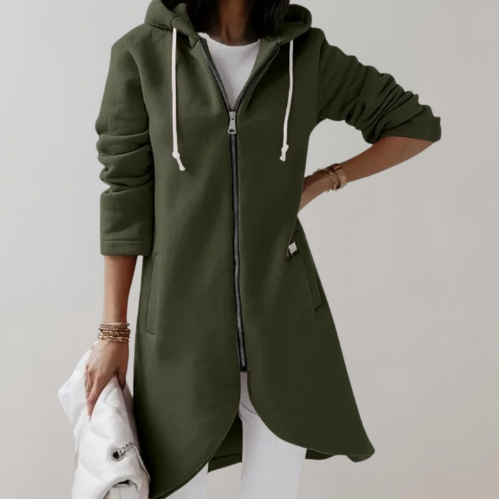 Donkergroene dames hoodie-jurk met capuchon, ritssluiting en zakken. Modieuze casual outfit, ideaal voor herfst en winter. Comfortabele pasvorm.