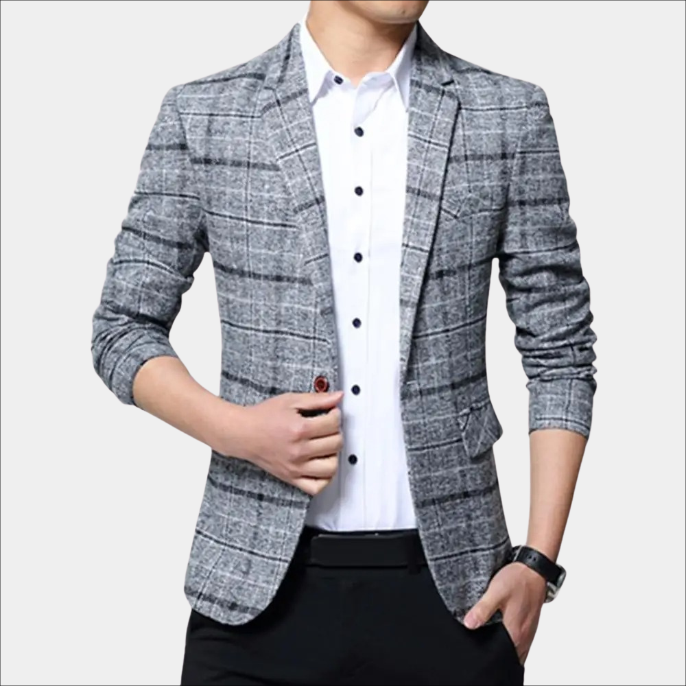 Grijze geruite blazer voor heren, stijlvolle zakelijke outfit, gedragen met wit overhemd en zwarte broek. Perfect voor formele gelegenheden.