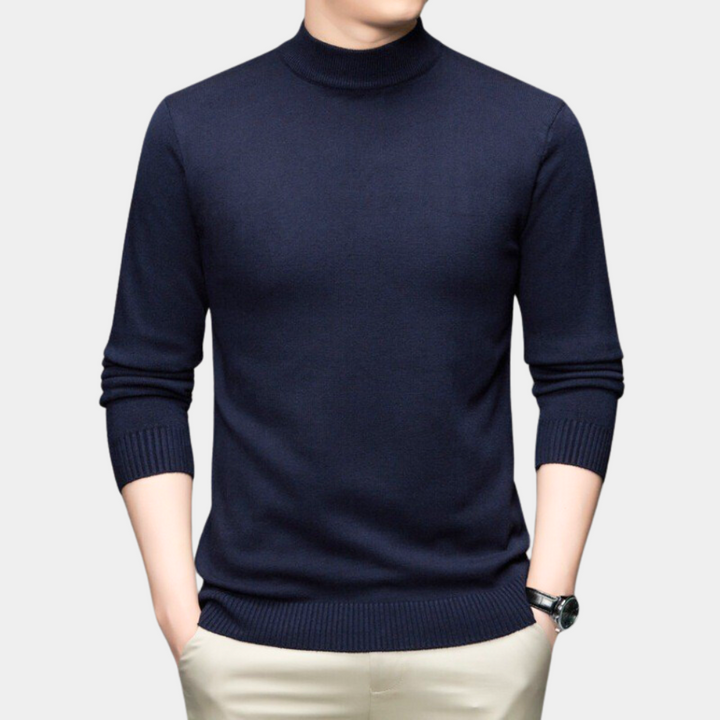 Donkerblauwe coltrui voor heren, lange mouwen, casual stijl, gemaakt van zachte stof. Perfect voor herfst- en wintermode.