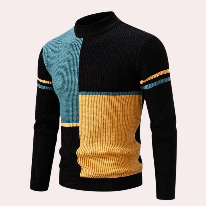 Zwart-groene trui met gele en blauwe blokken, lange mouwen, geribbelde textuur. Moderne herentrui, stijlvolle wintermode, warme kleding.