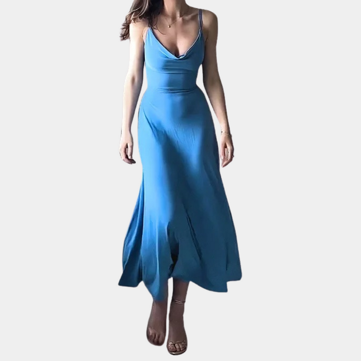 Blauwe maxi-jurk voor dames met diepe halslijn en vloeiende rok, ideaal voor zomerfeesten. Elegante avondjurk, modieuze dameskleding.