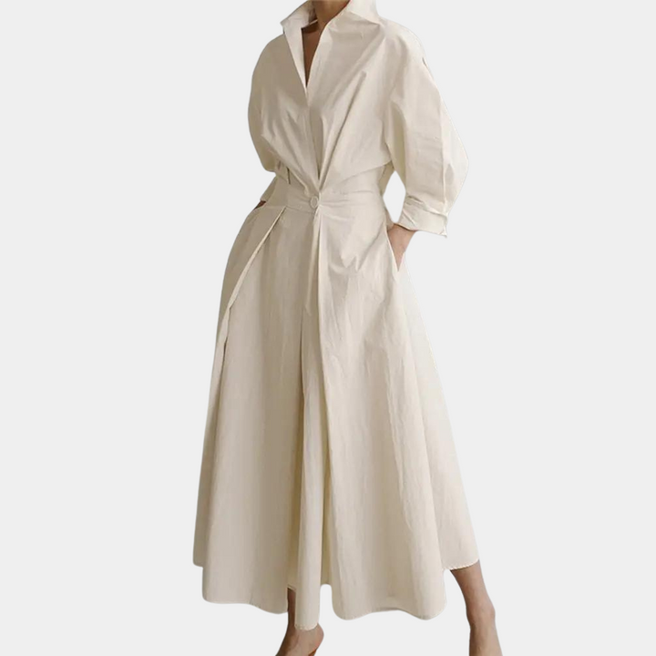 Beige damesjurk met lange mouwen, kraag en tailleband. Elegante midi-jurk voor damesmode, perfect voor formele en casual gelegenheden.