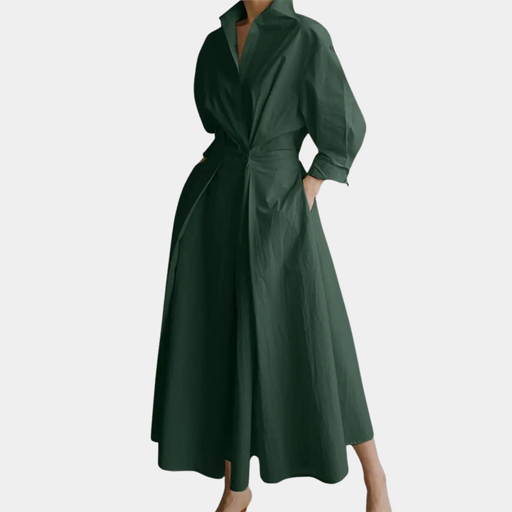 Donkergroene damesjurk met lange mouwen en kraag, elegante A-lijn snit, geschikt voor formele gelegenheden. Stijlvolle mode voor vrouwen.