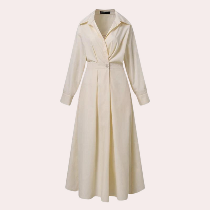 Elegante crèmekleurige damesjurk met lange mouwen en knoopsluiting, perfect voor formele gelegenheden. Stijlvolle midi-jurk voor damesmode.