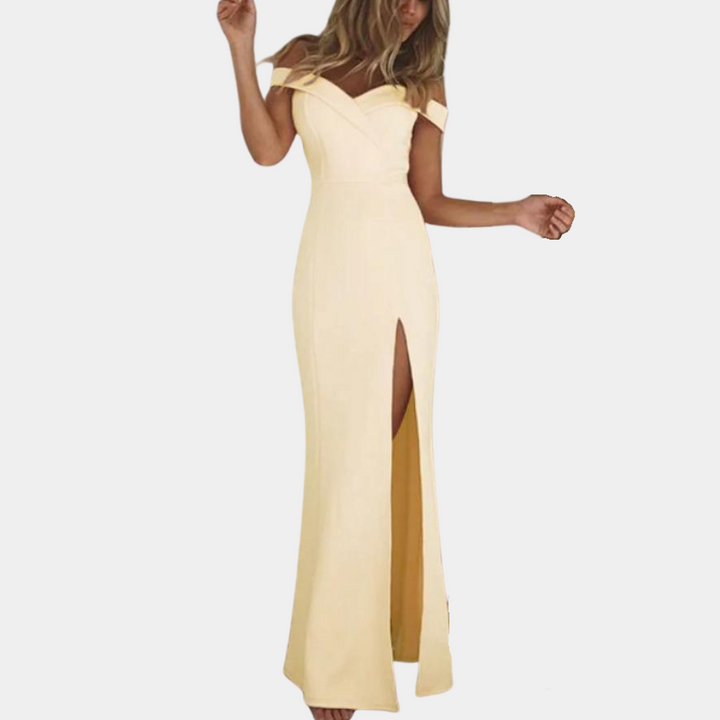Elegante gele avondjurk met off-shoulder ontwerp en hoge split, perfect voor formele gelegenheden. Stijlvolle damesmode, zomerjurk.