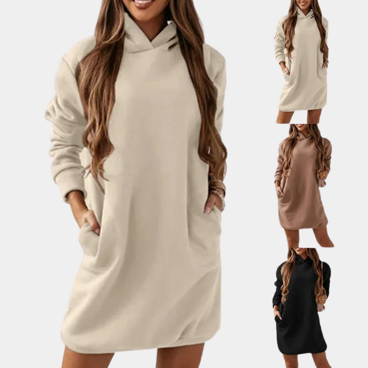 Beige oversized hoodie jurk voor dames, lange mouwen, casual stijl, met zakken. Verkrijgbaar in beige, bruin en zwart. Comfortabele loungewear.