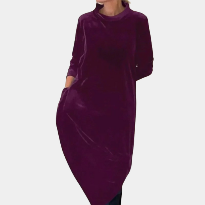 Paarse fluwelen jurk met lange mouwen en zakken, elegant en comfortabel, ideaal voor herfstmode. Perfect voor casual en formele gelegenheden.