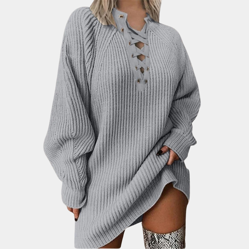 Grijze oversized trui met vetersluiting, lange mouwen en geribbelde textuur. Modieuze dameskleding, comfortabele en trendy stijl.