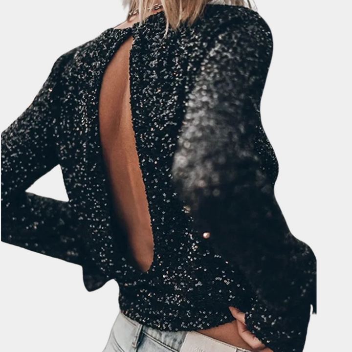 Zwarte pailletten top met open rug, lange mouwen en elegante glans. Perfect voor feestelijke gelegenheden en avondkleding.
