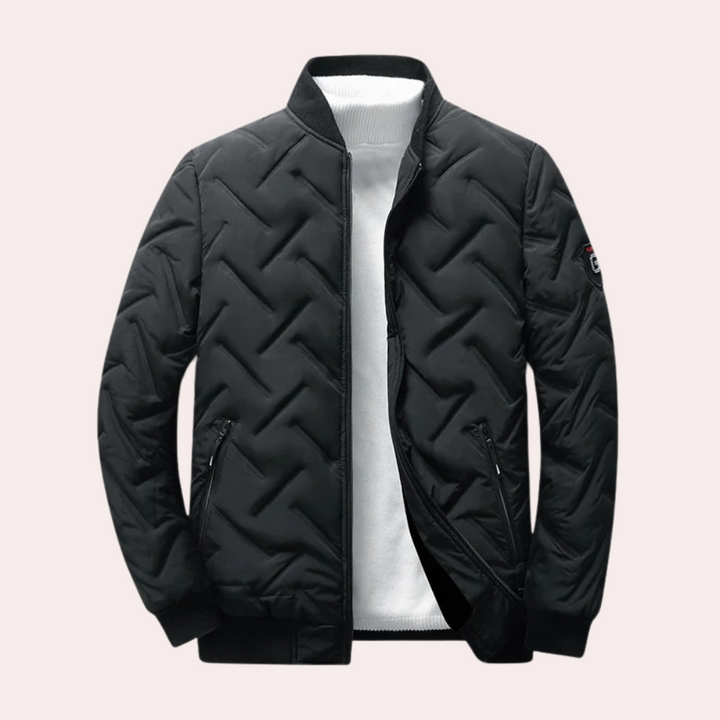 Zwarte gewatteerde jas voor heren met ritssluiting, geribbelde kraag en mouwen. Stijlvolle winterjas, ideaal voor casual en outdoor activiteiten.