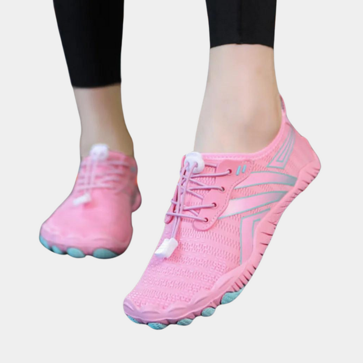 Roze sportschoenen voor dames met veters, ademend mesh, lichtgewicht ontwerp, ideaal voor hardlopen en fitness.