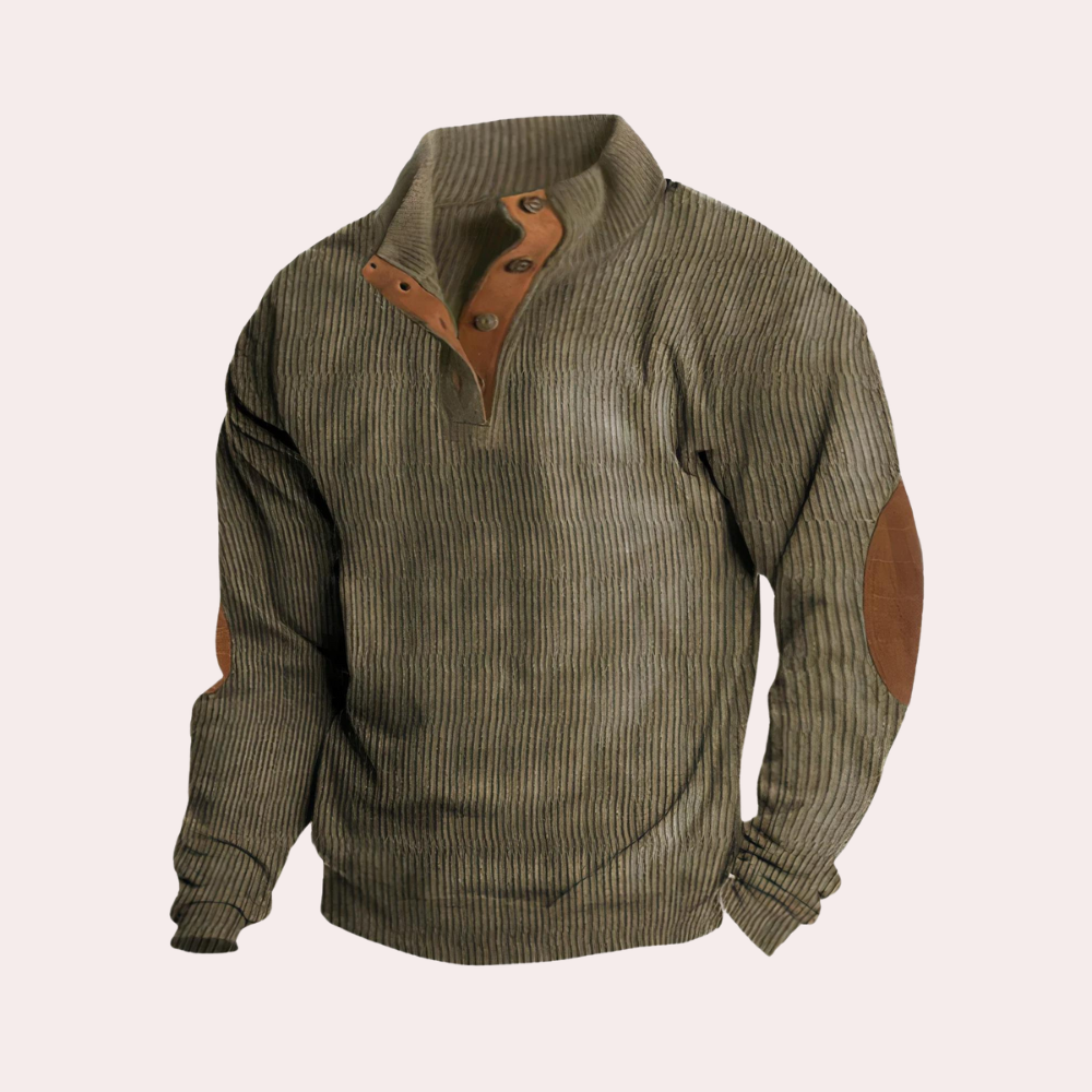 Groene geribbelde trui met bruine suède elleboogstukken en knoopsluiting, herenkleding, herfstmode, warme trui, casual stijl.