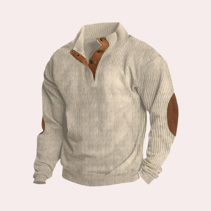 Khaki trui met knopen, geribbelde stof en bruine suède elleboogstukken. Stijlvolle herentrui, ideaal voor casual en wintermode.