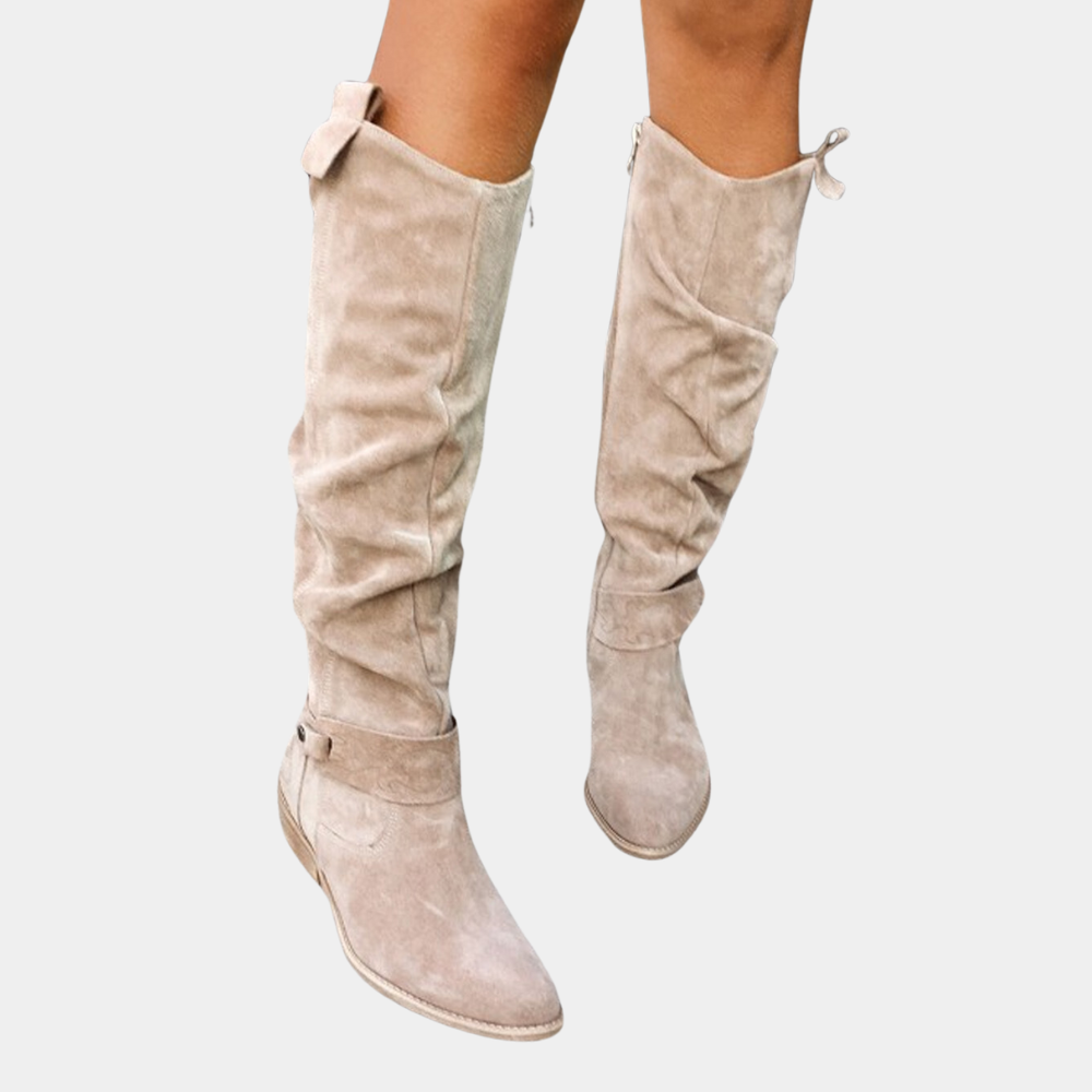 Lange beige suède laarzen voor dames, kniehoge stijl met ritssluiting en decoratieve strik, modieuze en comfortabele schoenen voor dagelijks gebruik.
