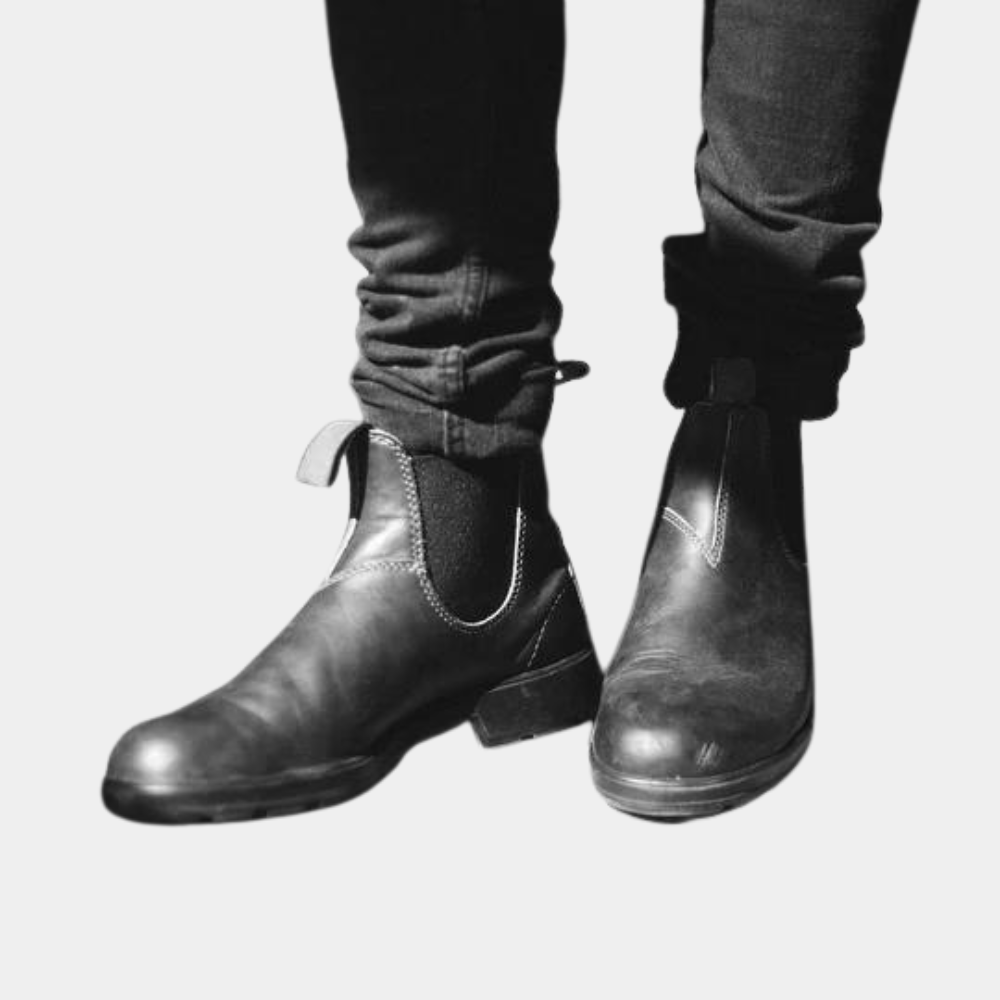 Zwarte leren Chelsea boots voor dames, stijlvolle enkellaarzen met elastische zijkanten en lage hak, perfect voor casual en formele outfits.