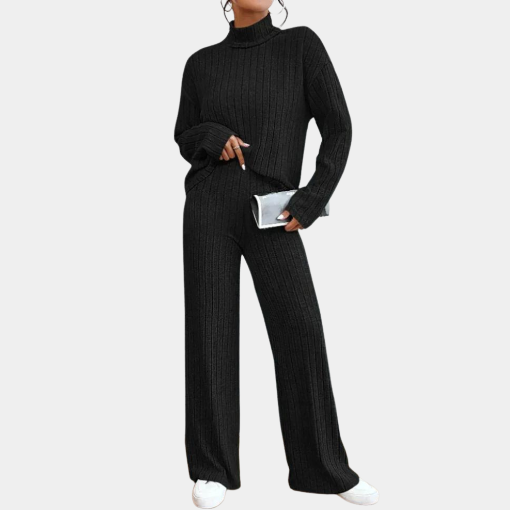 Zwarte gebreide damestrui en broek set, comfortabele loungewear, modieuze outfit met wijde pijpen, ideaal voor casual en stijlvolle gelegenheden.