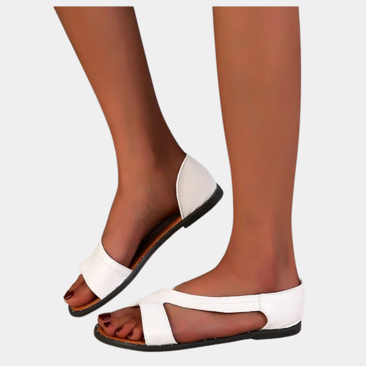 Witte dames sandalen met open teen en platte zool, stijlvolle zomerschoenen voor casual en formele gelegenheden, comfortabele pasvorm.