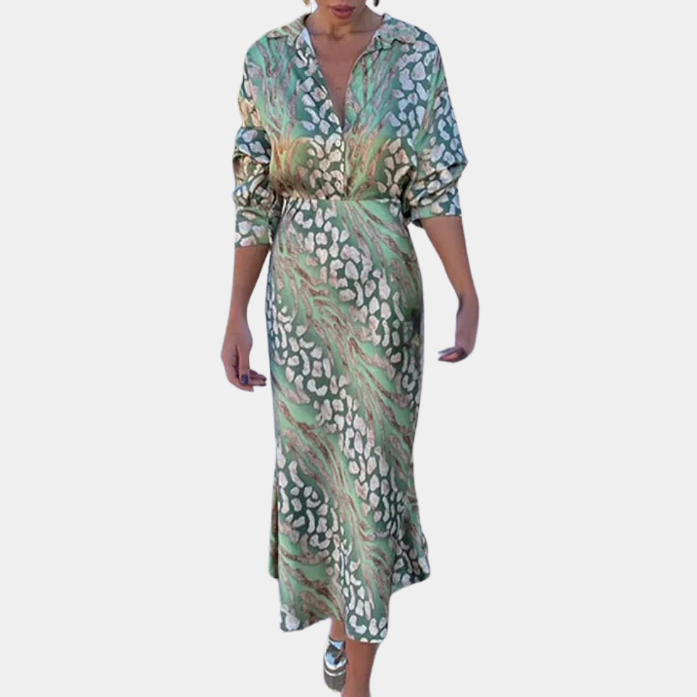 Groene damesjurk met abstract patroon, lange mouwen en V-hals. Perfect voor modieuze, casual of formele gelegenheden. Trendy damesmode.