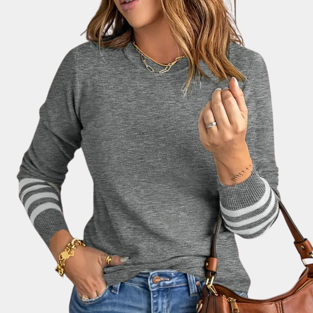 Grijze damestrui met lange mouwen en gestreepte details, casual stijl. Perfect voor herfstmode. Comfortabele pasvorm, ideaal voor dagelijks gebruik.