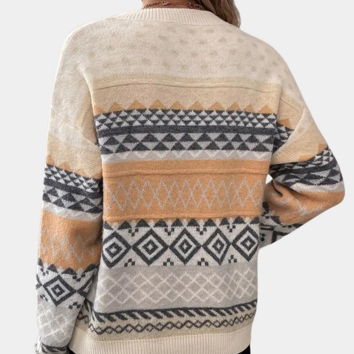 Beige damestrui met geometrisch patroon, Scandinavisch design, warme winterkleding, gebreide stof, modieuze casual stijl, comfortabele pasvorm.