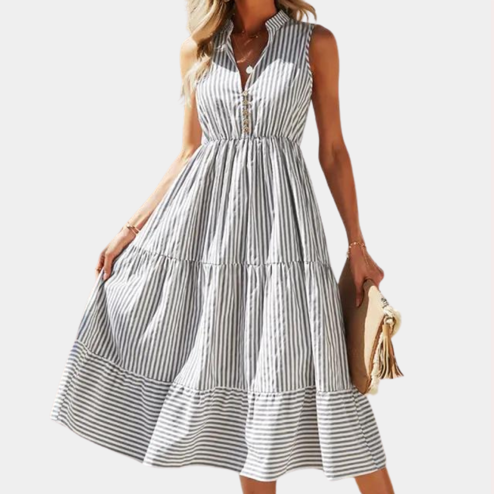 Grijze gestreepte zomerjurk voor dames, mouwloos met knoopsluiting, ideaal voor casual en strandoutfits. Stijlvol en comfortabel ontwerp.