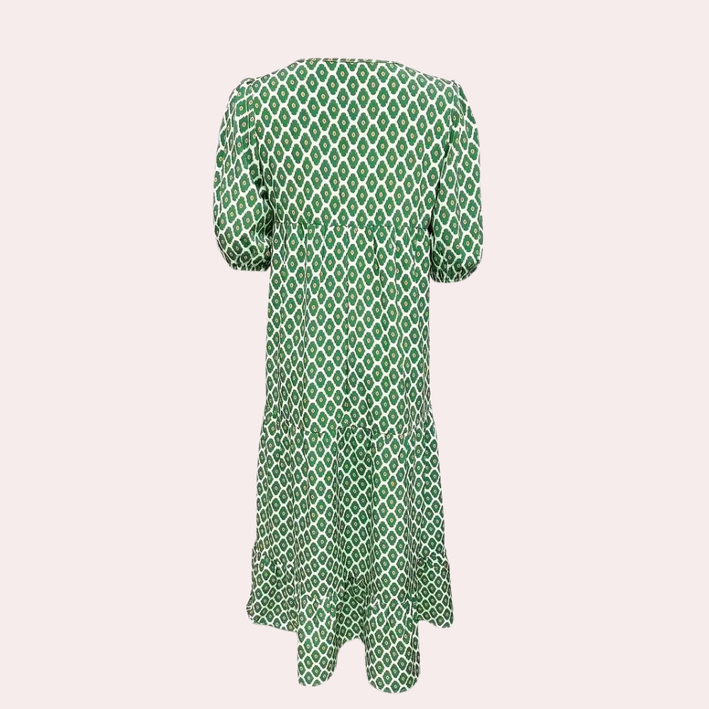 Groene jurk met ruitpatroon, korte mouwen en ruches. Perfect voor zomerse dagen. Trendy damesmode, comfortabel en stijlvol design.