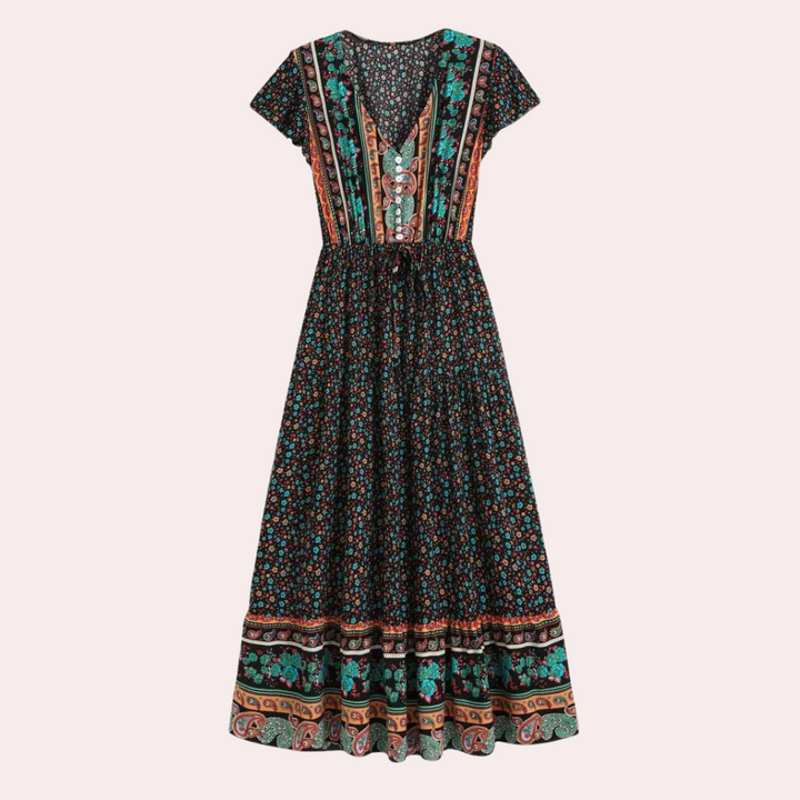 Zwarte bohemian maxi-jurk met kleurrijke bloemenprint, korte mouwen en V-hals. Perfect voor zomerse dagen en festivals. Vrouwelijke mode.