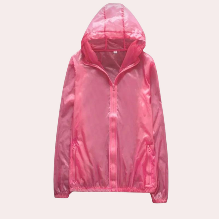Roze transparant regenjack met capuchon, lichtgewicht en waterafstotend. Perfect voor damesmode, outdoor activiteiten en regenachtige dagen.